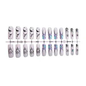 Halloween long coffin press-on nails featuring bat and spider web patterns with rhinestones