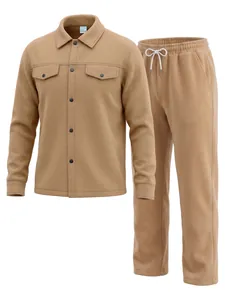 Macro view of tan fleece two-piece shirt and pants set with lapel and drawstrings