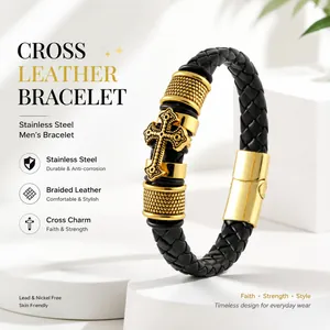 Macro view of black braided leather men's bracelet with gold cross charm and stainless steel clasp.