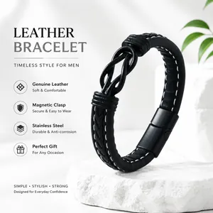 Detailed view of men's black leather bracelet featuring a magnetic clasp and woven knot