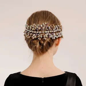 Rear view of a luxury rhinestone bridal headband styled in a braided updo hairstyle