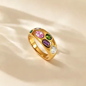 Detailed macro view of 18k gold-plated stainless steel ring with colorful zircons
