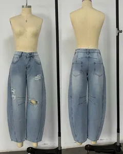 Detailed front and back view of light blue ripped wide-leg vintage denim pants for women