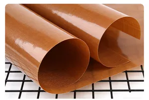 Detailed view of brown heat-resistant non-stick baking cloth on a metal cooling rack