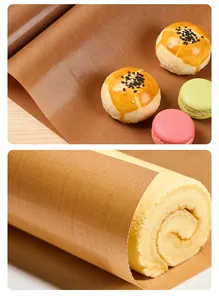 Detail view of brown reusable non-stick baking cloth showing texture with pastries