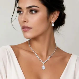 Elegant French vintage bridal jewelry set featuring teardrop crystal necklace and earrings