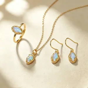 Detailed view of marquise opal jewelry set including ring, necklace and earrings