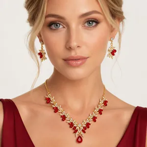Elegant bridal jewelry set featuring red crystal floral necklace and matching earrings