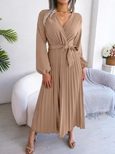 Elegant V-neck pleated maxi dress with long sleeves and belted waist for autumn.