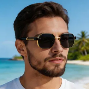 Close-up of a man wearing octagonal polarized sunglasses at a sunny tropical beach