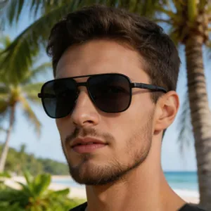 Detailed view of men's square polarized sunglasses worn by a model in a beach setting