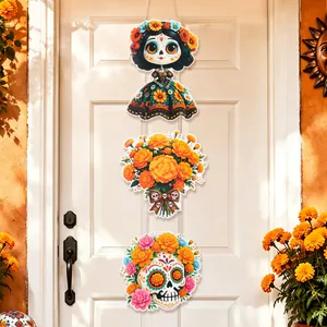 Vibrant Day of the Dead three-tier door hanging with sugar skull and marigold designs.