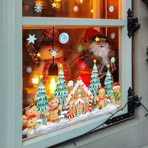 Festive Christmas window stickers featuring gingerbread house and trees on glass