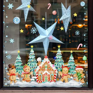 Festive Christmas window stickers with gingerbread house, trees, and cute gingerbread men.