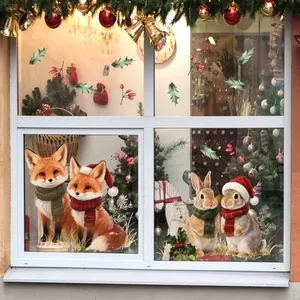Festive Christmas window cling stickers featuring cute cartoon foxes and rabbits on glass