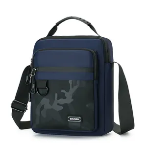 Durable blue men's crossbody bag featuring camo pattern and sturdy top handle for outdoors