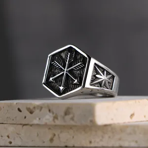Vintage punk style stainless steel ring featuring crossed arrows design on hexagonal face