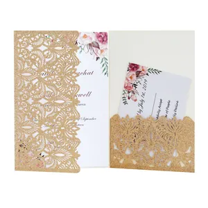 Detailed view of gold glitter laser-cut invitation with elegant floral card inserts