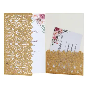 Close-up detail of laser-cut gold glitter invitation card with elegant floral insert