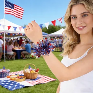 Close-up of red white and blue tinsel wrist flower with stars for July 4th party