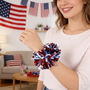 Close-up of red white blue festive tinsel wrist flower worn for Independence Day party