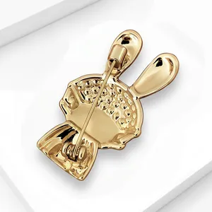 Detail view showing the back pin mechanism of the cute gold rabbit brooch.