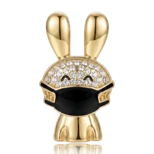 Cute gold bunny brooch with sparkling crystals and black mask detail for women