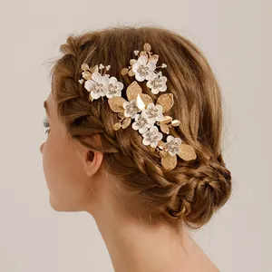 Vintage handmade bridal wedding hair comb set with gold leaves and white flowers