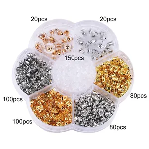 Detailed view of flower-shaped box with assorted gold, silver and silicone earring back sets
