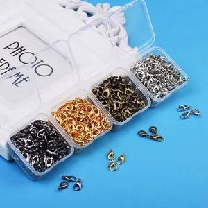 Assorted lobster clasps in four metallic colors stored in a transparent plastic organizer box.