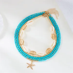 Bohemian multi-layer necklace set with turquoise beads, shells and starfish pendant