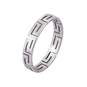 Minimalist silver titanium steel ring featuring a hollow Great Wall pattern for couples