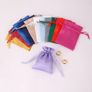 Colorful satin drawstring pouches for jewelry gift packaging in assorted bright colors