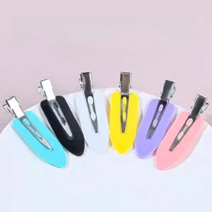 Colorful set of seven flat duckbill hair clips for no-trace styling and DIY crafts