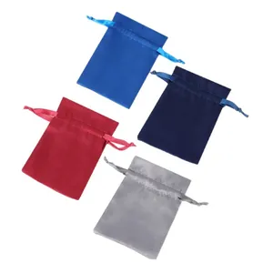 Set of four satin drawstring pouches for jewelry and gift packaging in various colors