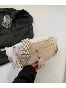 Stylish beige PU leather chest bag with tassels and geometric wide strap