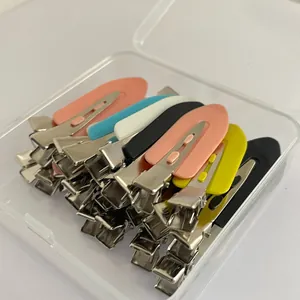 Set of colorful creaseless makeup hair clips in a portable transparent plastic case