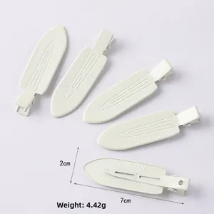 Close-up of white seamless duckbill hair clips with 7cm length and weight info.