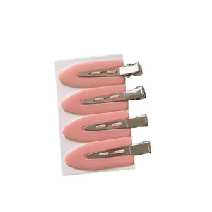 Set of four pink seamless duckbill hair clips for fringe styling and side hair