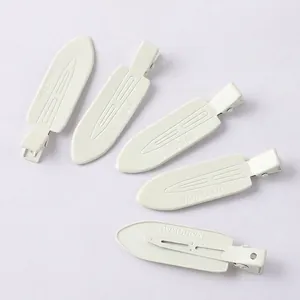 Off-white matte finish no-trace duckbill hair clip set showing dimensions and unit weight
