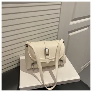 Elegant cream-white faux leather shoulder bag with vintage buckle and zipper details for women