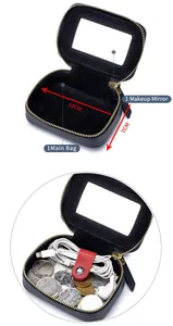 Kleine Leder-Kosmetiktasche mit Spiegel, 10 cm Größe und internem Stauraum-Detail