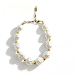 Detail view of baroque freshwater pearl bracelet with gold-plated spacer beads.