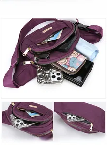 Detailed view of purple large capacity waist bag with multiple compartments