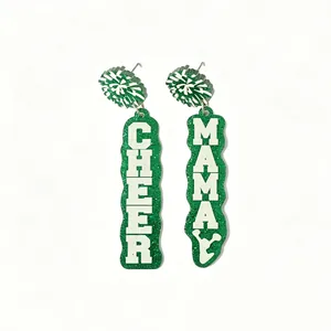 Macro view of green glitter acrylic earrings with Cheer Mama letter design