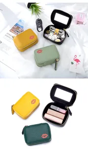 Kompakte Lippenstifttasche aus echtem Leder mit integriertem Spiegel und Lippenprint