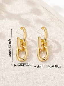 Detailed view of gold oval link earrings showing 4cm height and 1.2cm width specs