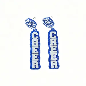 Detail view of blue glitter acrylic earrings featuring white "CHEER" lettering.