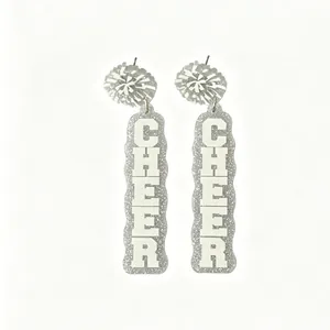 Detailed close-up view of silver glitter acrylic earrings with white CHEER lettering