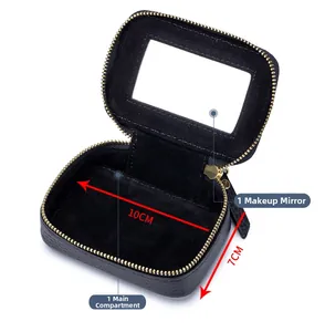 Innenansicht der Mini-Leder-Lippenstifttasche mit integriertem Kosmetikspiegel und Fach